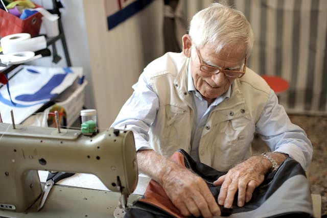 resident using a sewing machine for an activity