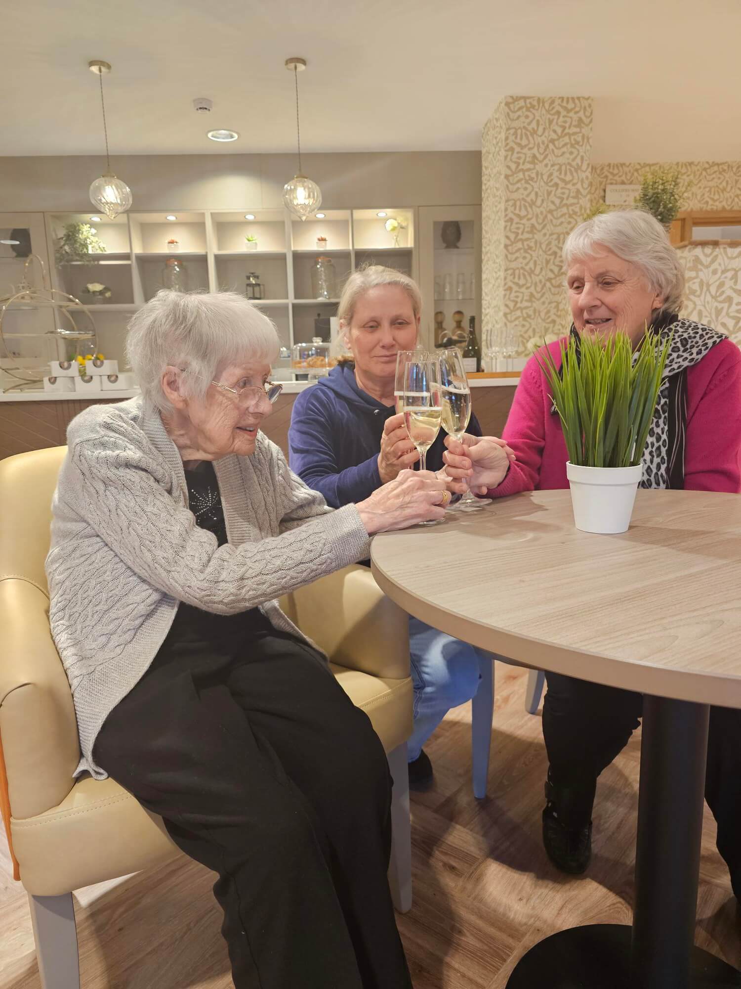 residents drinking prosecco together