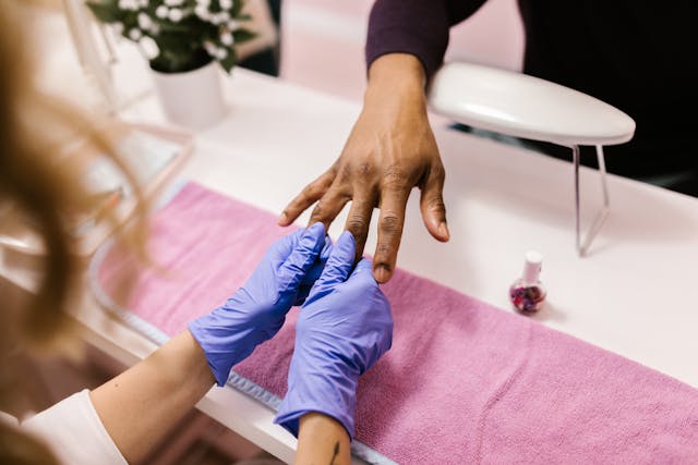 resident in salon getting their nails done