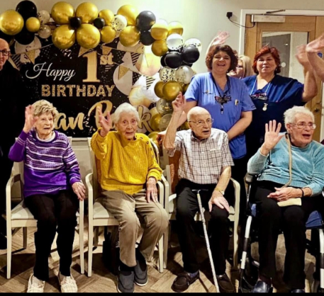 some of our residents at our first birthday party dancing to the entertainer