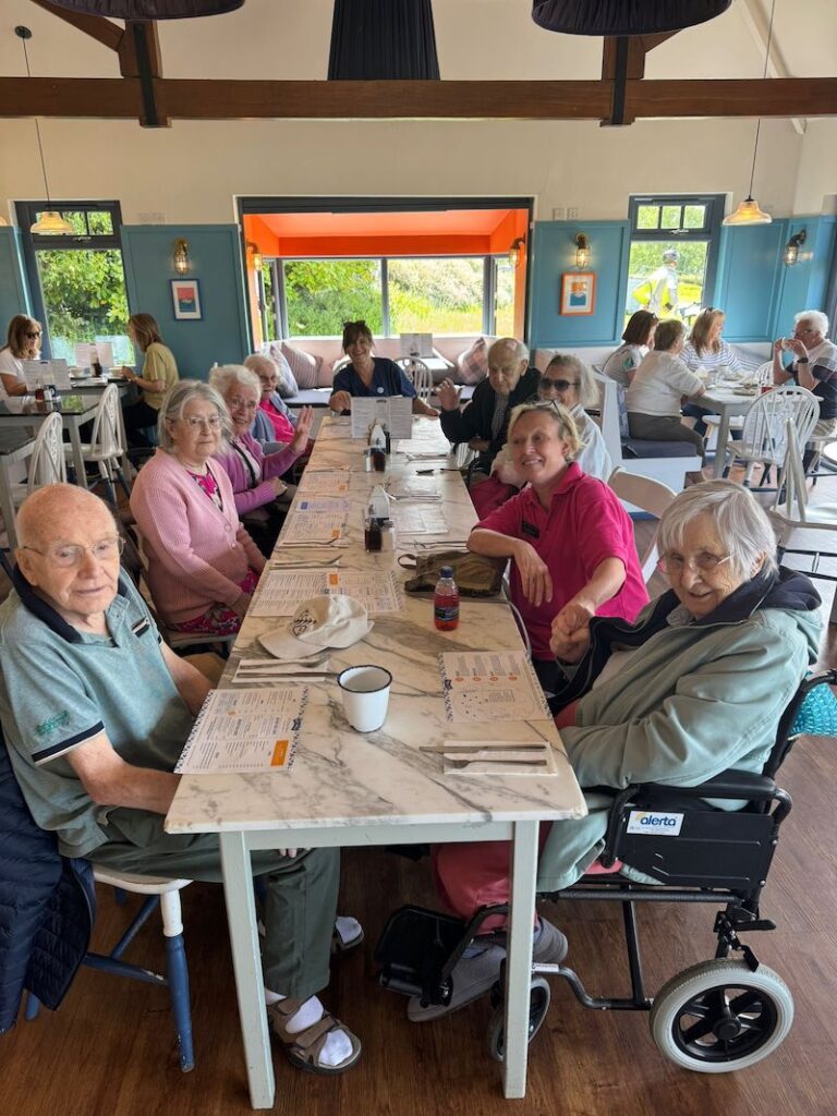 group photo of residents getting lunch at chew valley lake