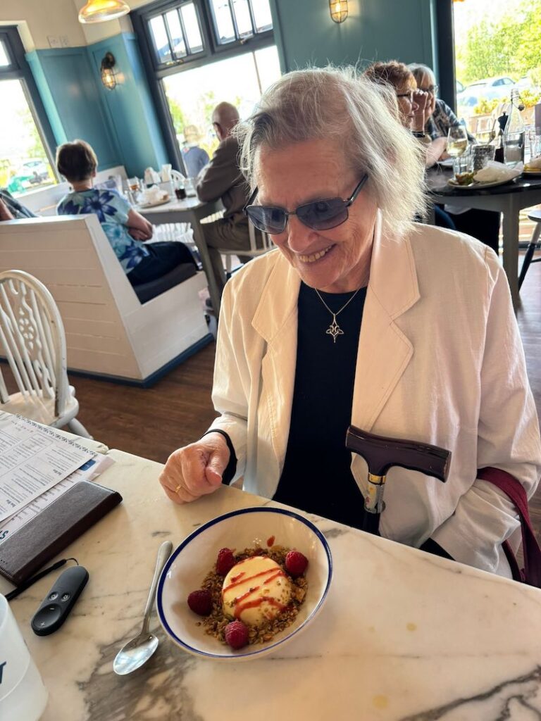 resident with ice cream at a local cafe
