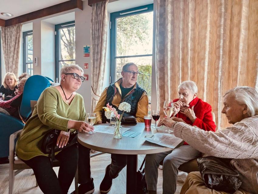 people sat around a table