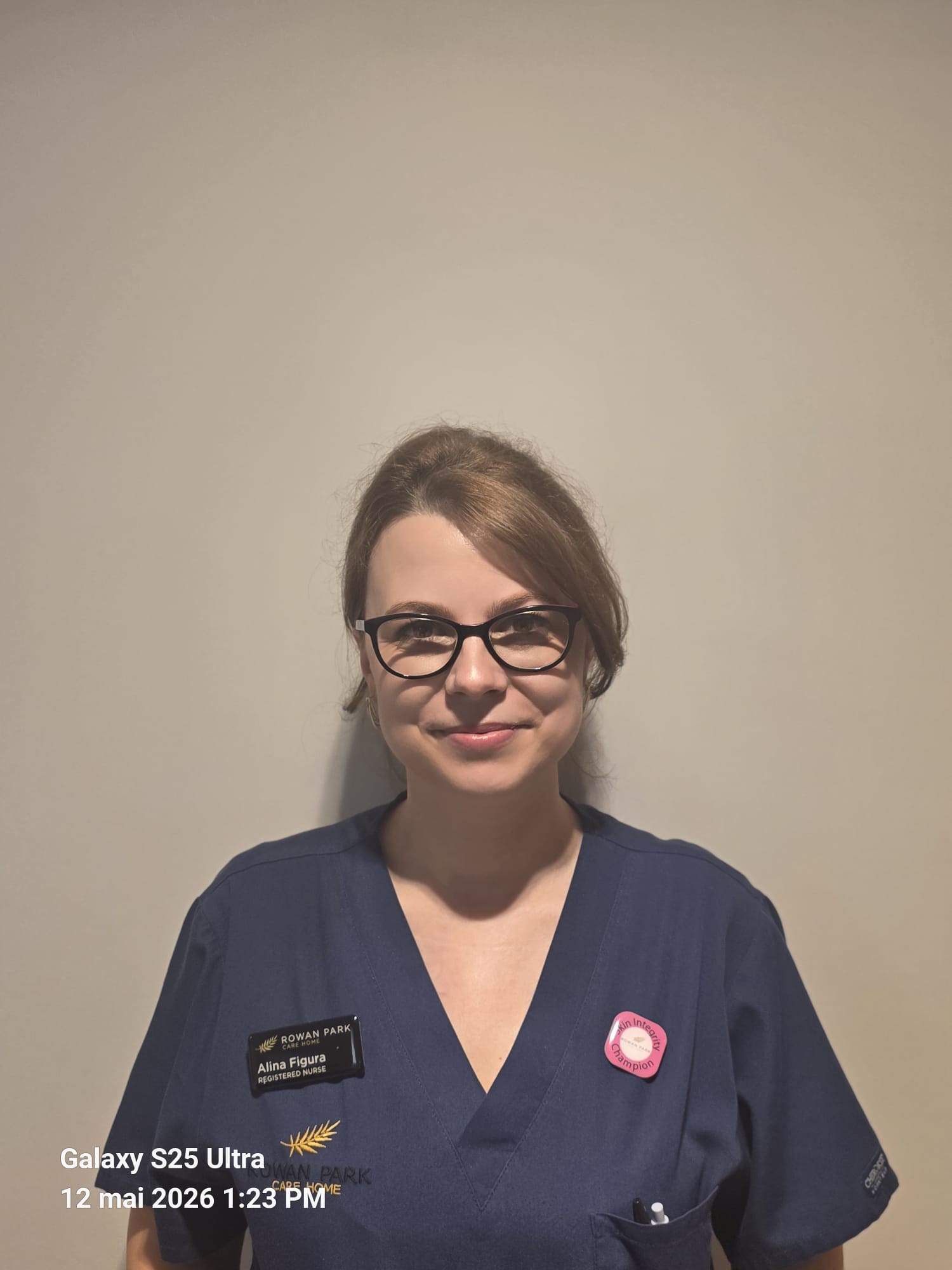 lady posing for staff photo