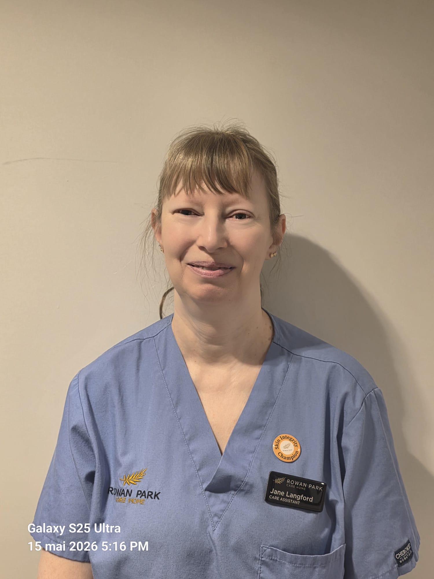 lady posing for staff photo